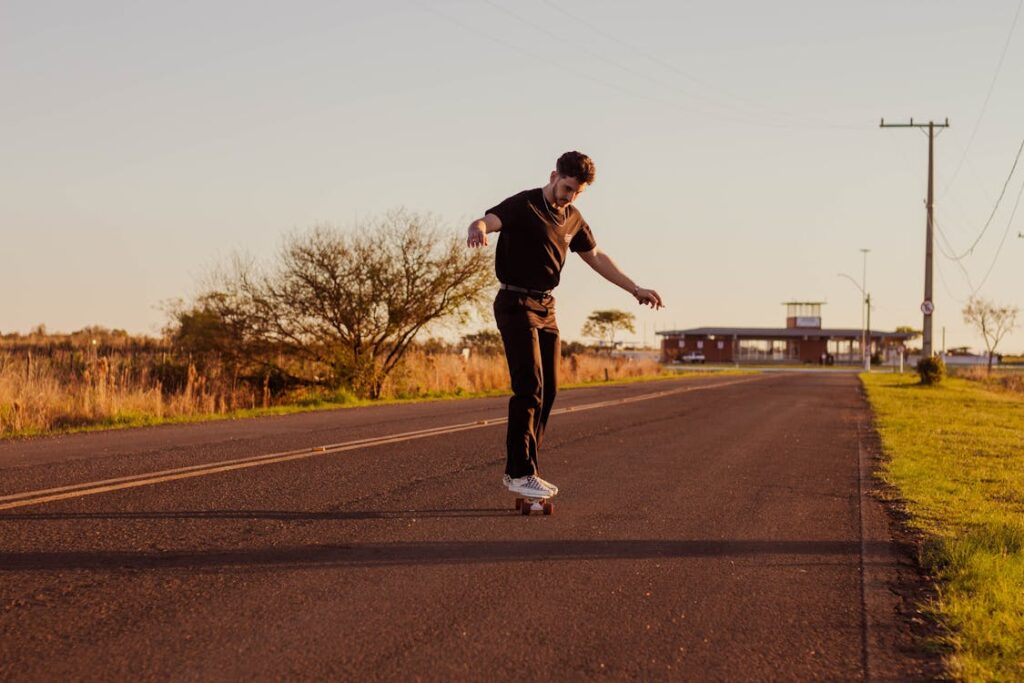 Person skateboarding on road - best electric longboards